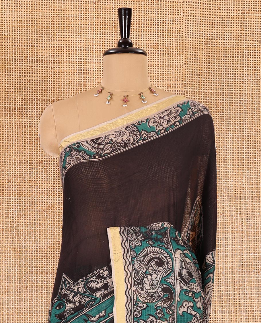 Green kalamkari floral, peacock, and human figurines printed Kota cotton saree, contrast printed border, peacock printed pallu, and a contrast floral printed blouse