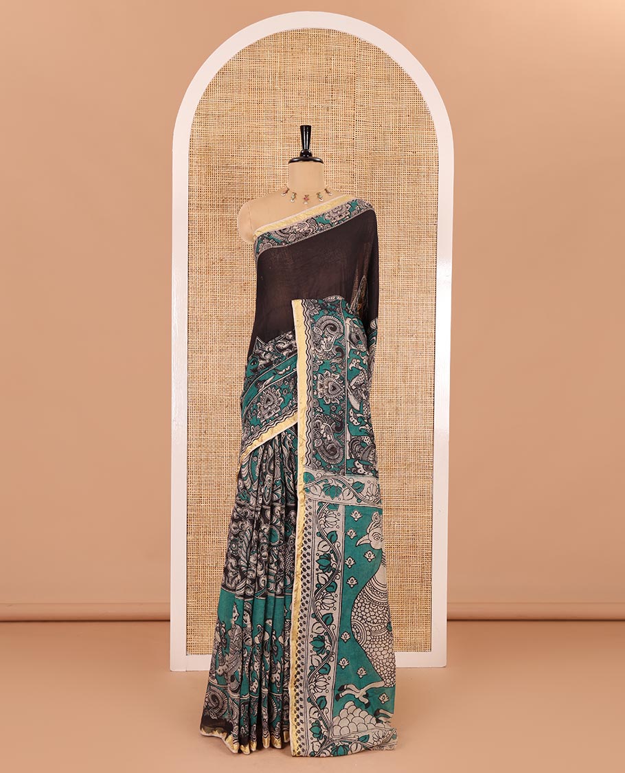 Green kalamkari floral, peacock, and human figurines printed Kota cotton saree, contrast printed border, peacock printed pallu, and a contrast floral printed blouse
