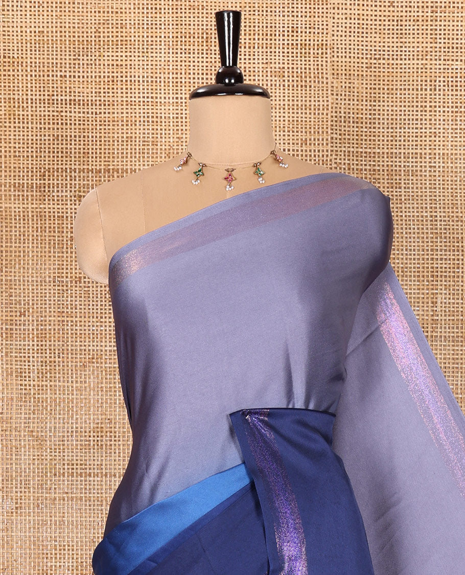 Blue Satin Crepe Saree Features 3D-Style Ombre Colours on Its Body, a Subtle Rose-Copper-Zari Woven Border, a Simple Plain Pallu, and a Plain Blouse