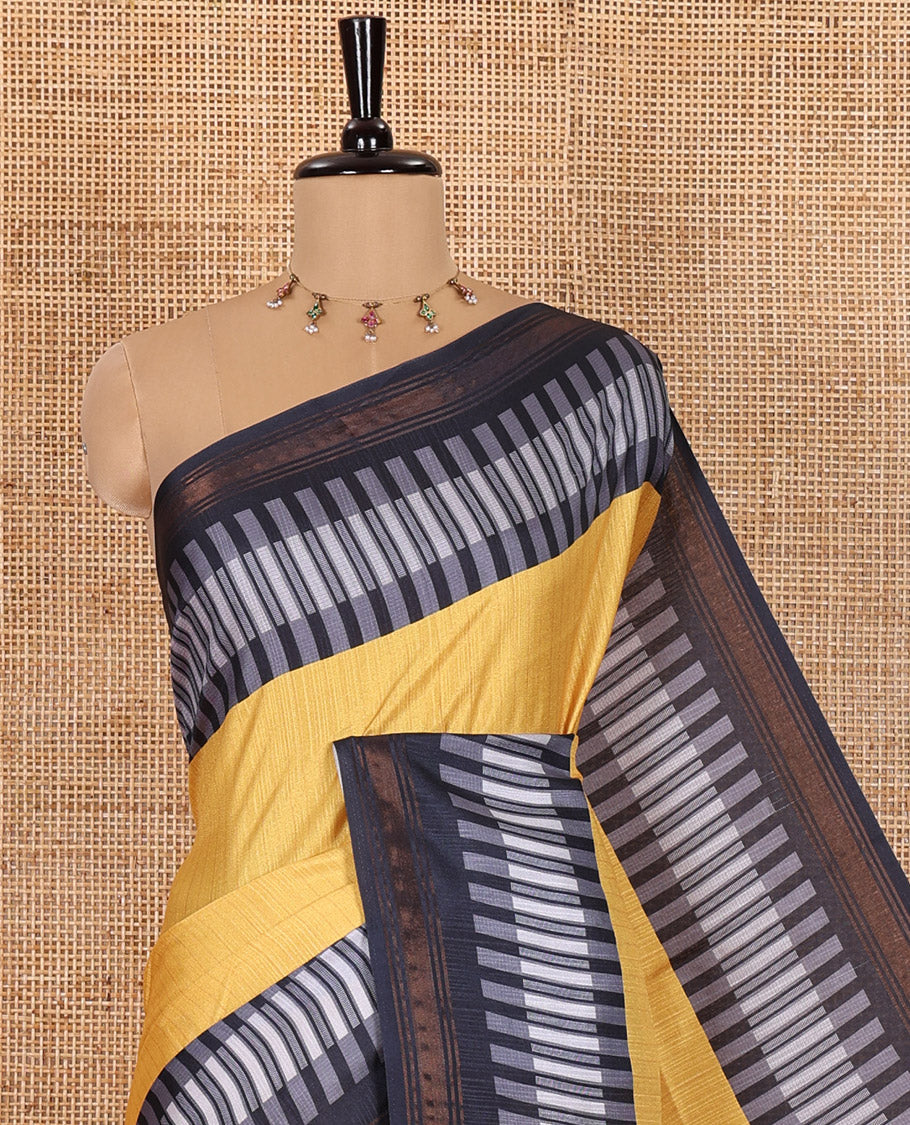 Yellow Manipuri Silk Saree Subtly Woven with Stripes All Over Its Body, Complemented by Contrast Geometric Print and Zari Work Border, Pallu Features Stripes, and Paired with a Contrast Striped Blouse