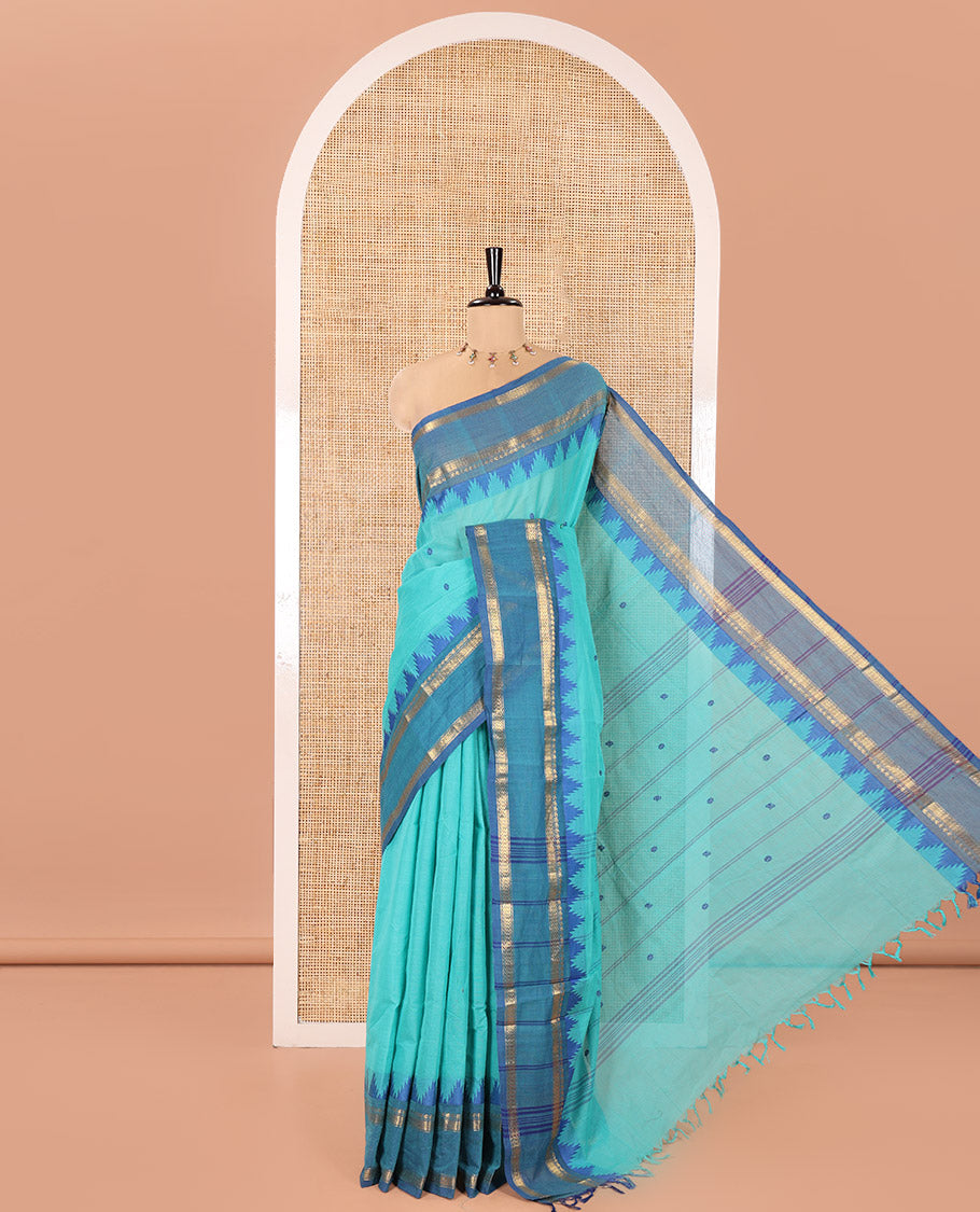 Rama Chettinad Cotton Saree, Subtly Sparkled with Thread Buttas All Over Its Body, Complemented by a Contrast Border Rettai Pettu Border of Paisley and Chevron Stripes, Subtly Designed Pallu, and Paired with a Matching Blouse