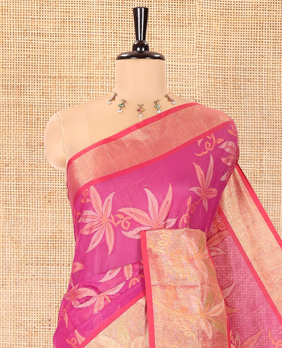 Magenta Chanderi Cotton Saree, Beautified with Leaf Motifs on Its Body, Complemented by a Contrast Border of Leaf Designs, Pallu Steeped with Colorful Floral Designs, and Paired with a Contrast Blouse