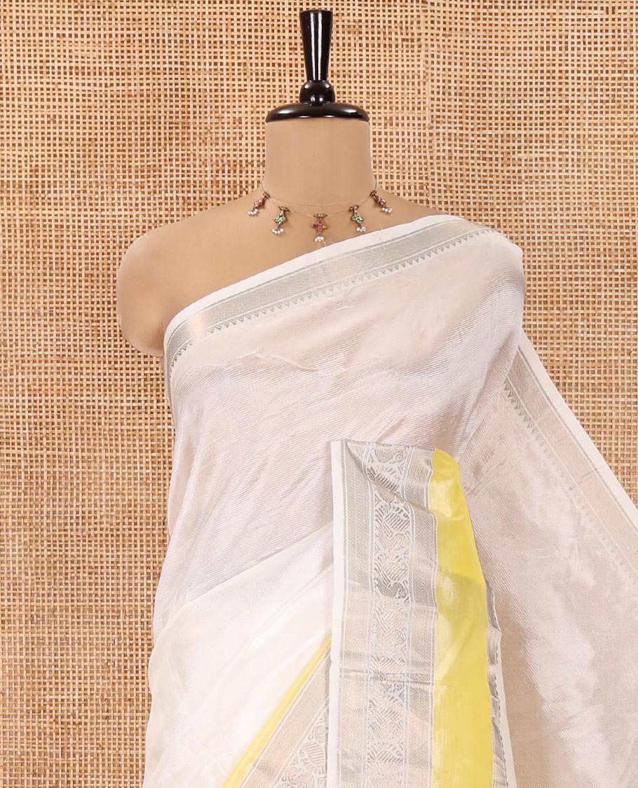 Half-White Mangalagiri Silk Saree, Sparsely Woven Stripes On Its Body, Complemented by Contrast Border of Temple and Peacock Designs, Striped Pallu and Paired with a Contrast Blouse