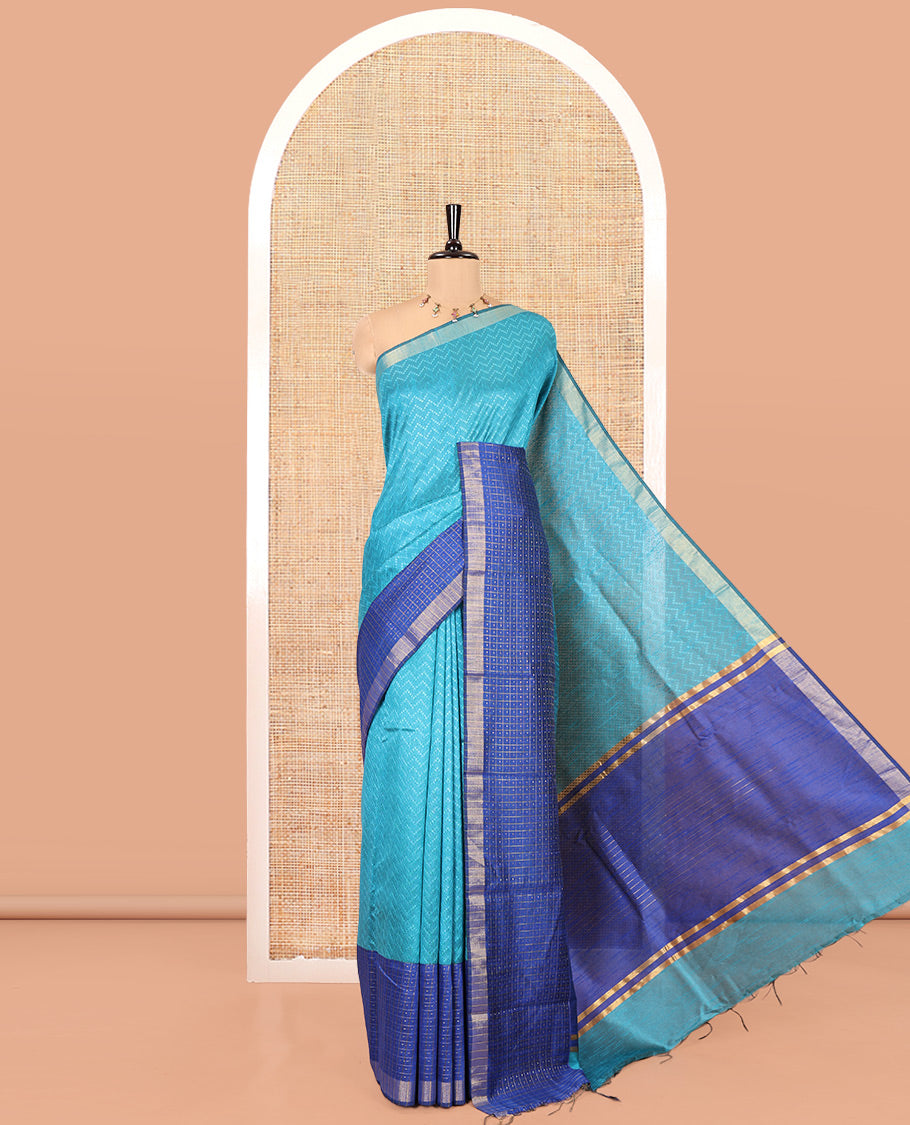 Rama Blue Semi-Raw Silk Saree, Delicately Woven with Zig-Zag Stripes All Over Its Body, Complemented by Contrast Border of Butta Enclosed Checks, Striped Pallu, and Paired with a Contrast Blouse