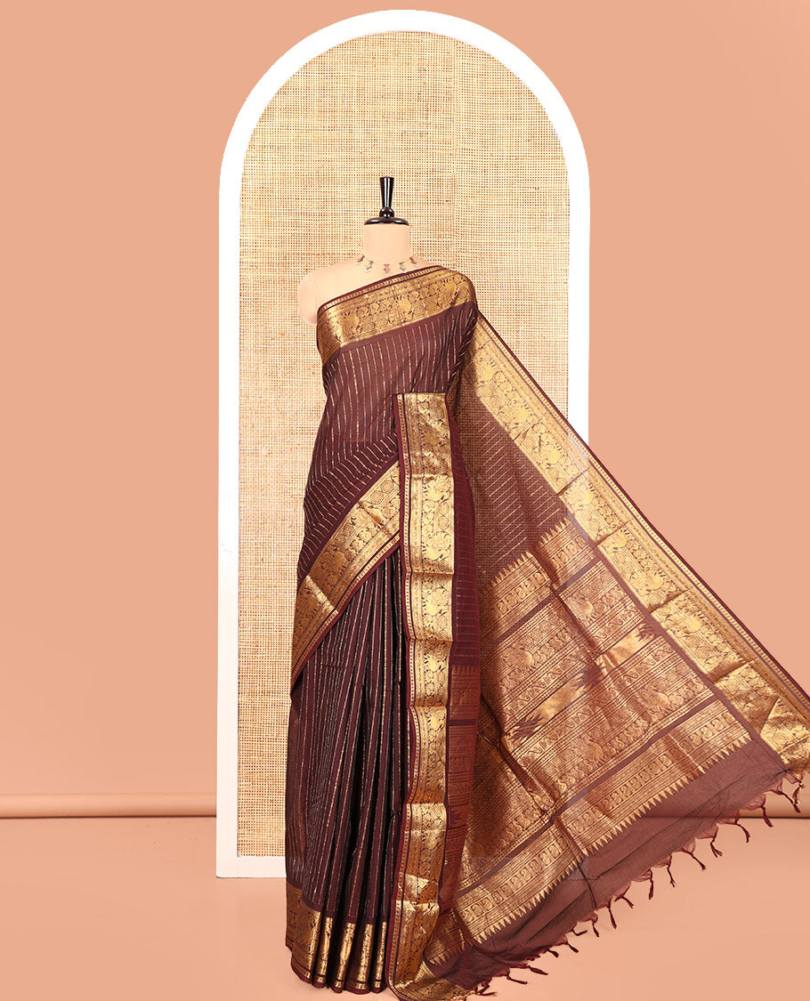 Brown Chettinad Cotton Saree, Spotlighted with Zari Stripes, Traditional Peacock-Chakram Border, Traditional Pallu, and a Matching Blouse