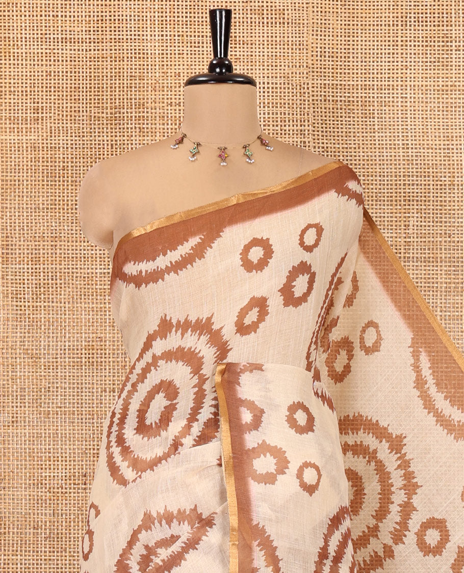 Cream-Brown Linen Cotton Saree, Adorned with Shibori Print, Contrast Piping Border, Kalamkari Floral Vine Pallu, and a Contrast Blouse
