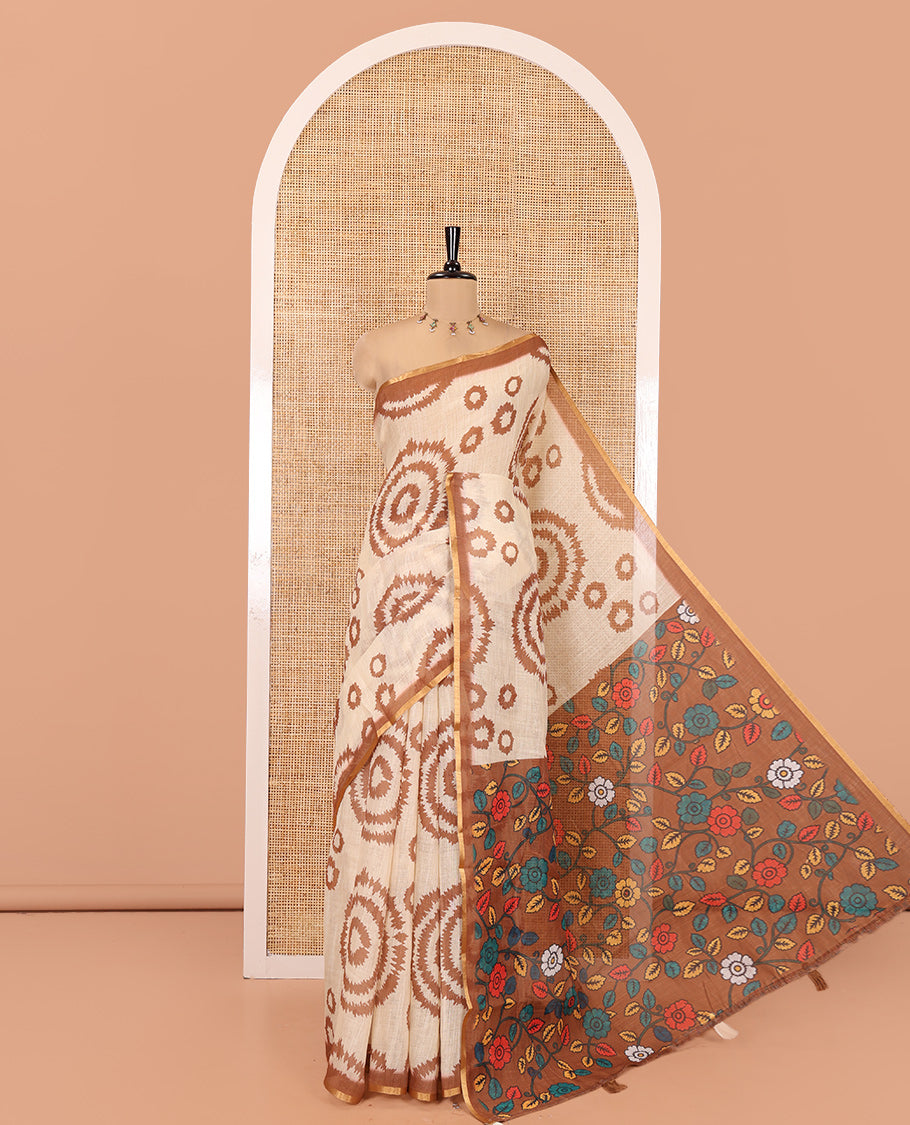 Cream-Brown Linen Cotton Saree, Adorned with Shibori Print, Contrast Piping Border, Kalamkari Floral Vine Pallu, and a Contrast Blouse