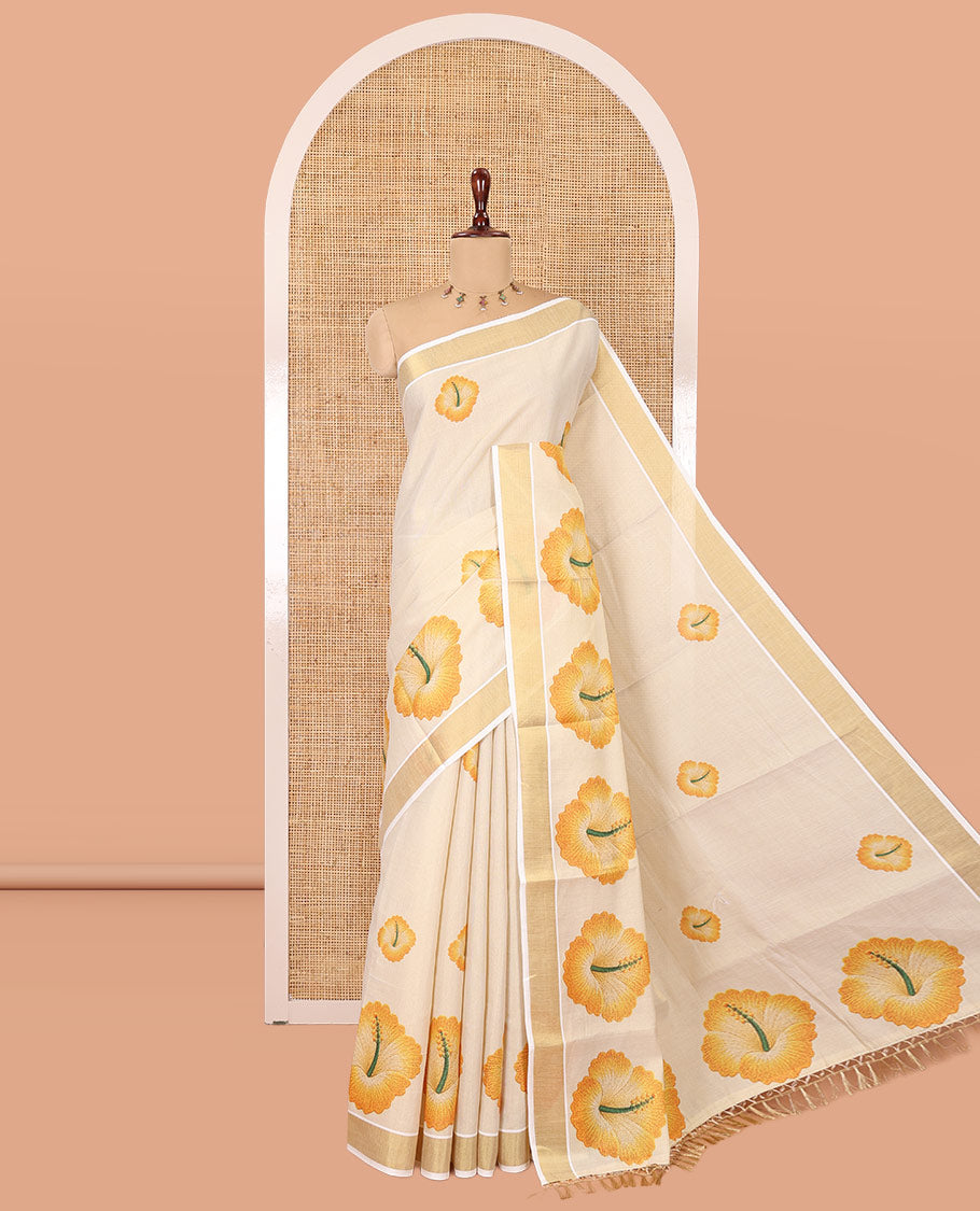 Cream Kerala Cotton Saree, Beautified with Hibiscus Motifs, a Zari Border, Hibiscus Pallu, and a Contrast Blouse