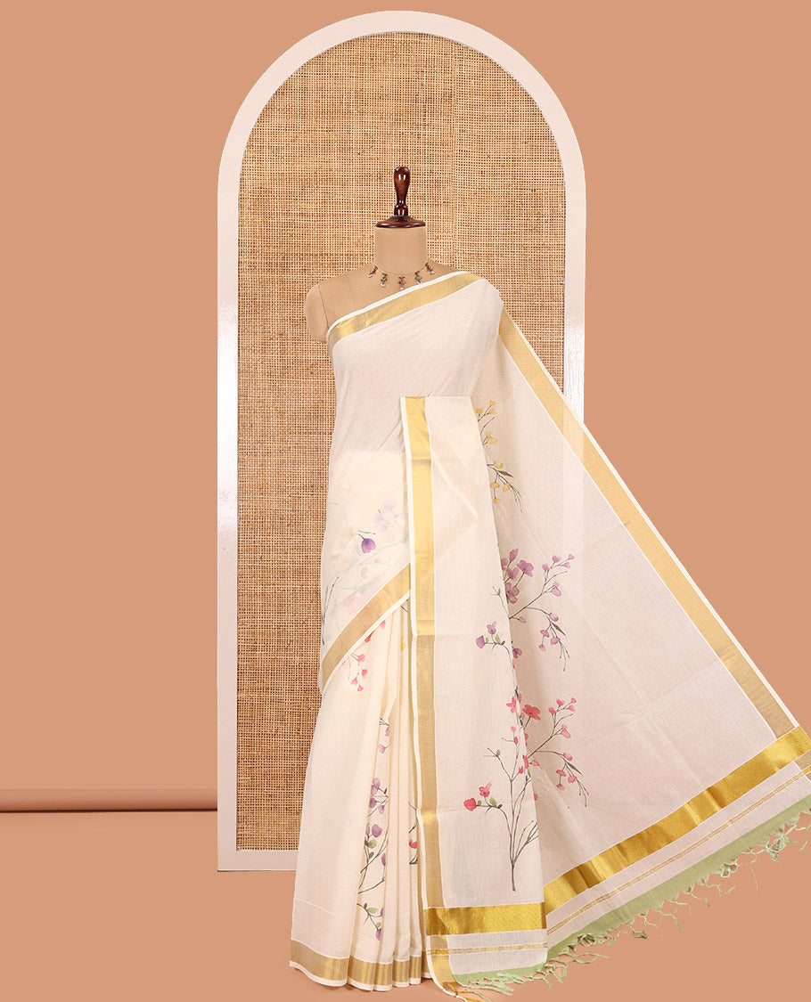 Cream Kerala Cotton Saree, Beautified with Floral Print, a Zari Border, Floral Pallu, a Contrast Blouse