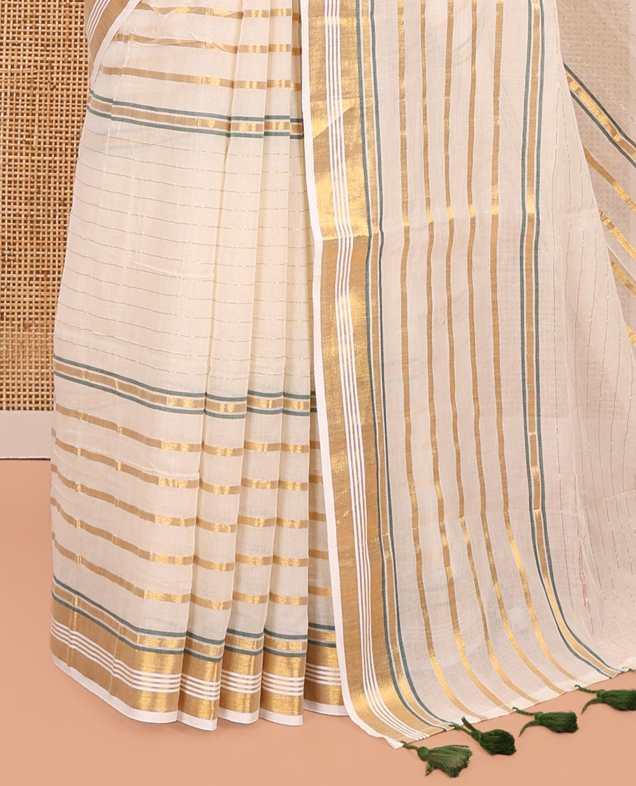 Cream Khadi Mul Cotton Saree, Decorated with Horizontal Gold Zari Stripes, a Zari Border, Green-Tasseled Pallu, and No Blouse
