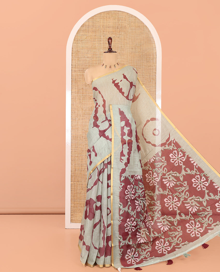 Pista Green Linen Cotton Saree, Adorned with Shibori Print, Gold Piping Border, Contrast Floral Printed Pallu, and Contrast Floral Printed Blouse