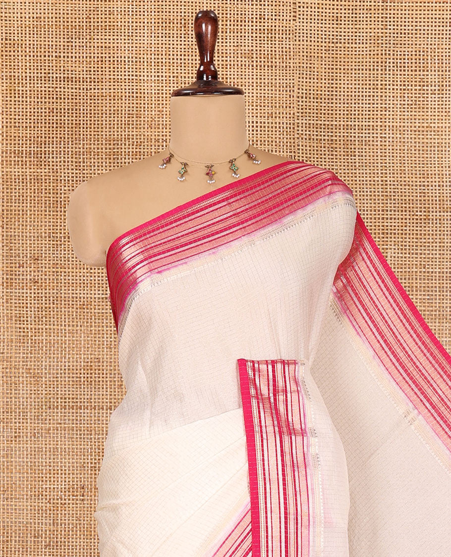 Cream Zari Checked Art Crepe Saree, Contrast Horizontal Striped Border, Zari Striped Pallu, and a Contrast Blouse