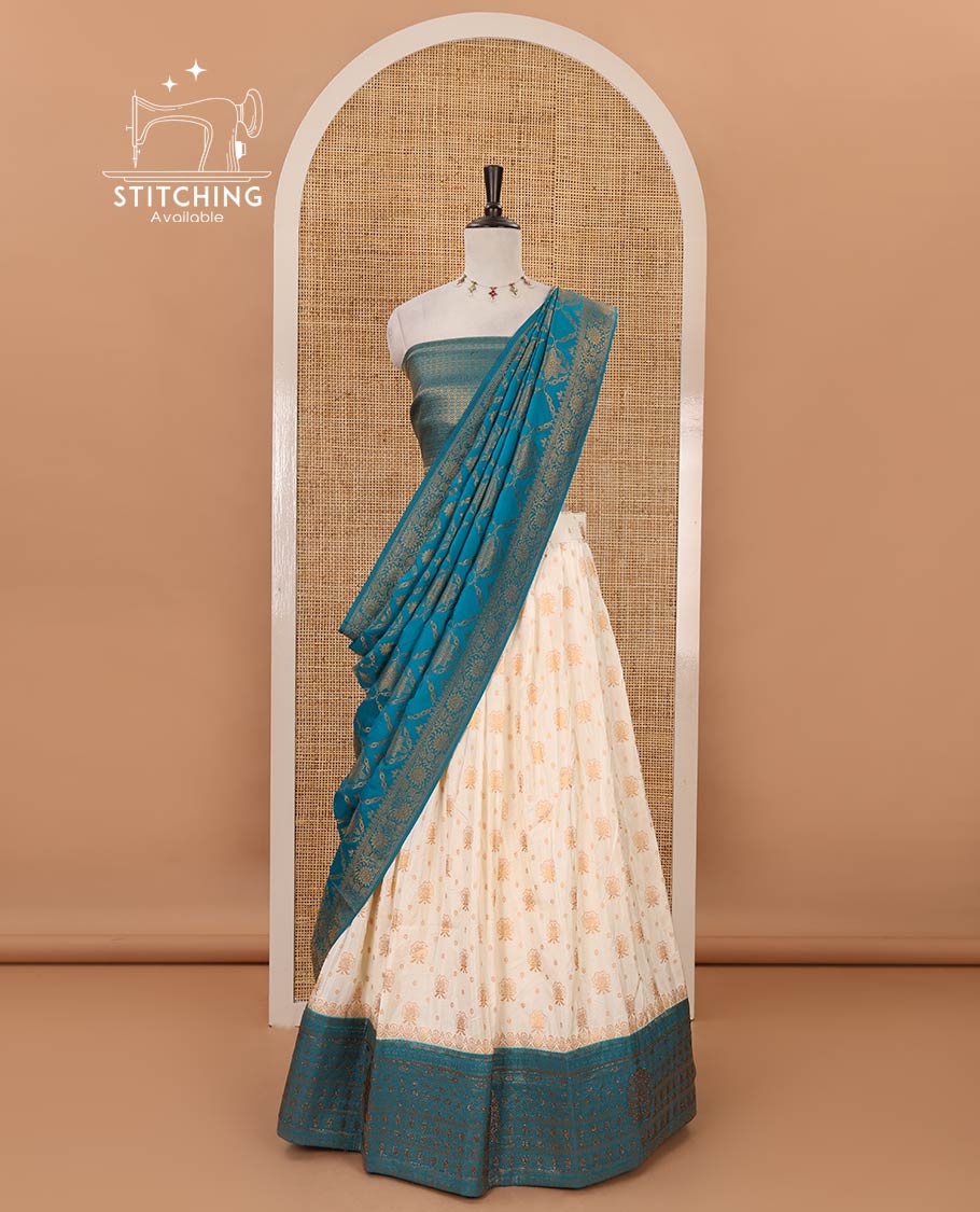 Cream semi-banaras half-saree, zari buttas & contrast Swarovski stonework traditional border skirt, jacquard blouse & contrast jaal jacquard blue dhavani