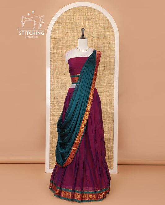 Violet mercedised cotton half-saree, plain contrast elephant zari border skirt, matching blouse & contrast green zari elephant border dhavani