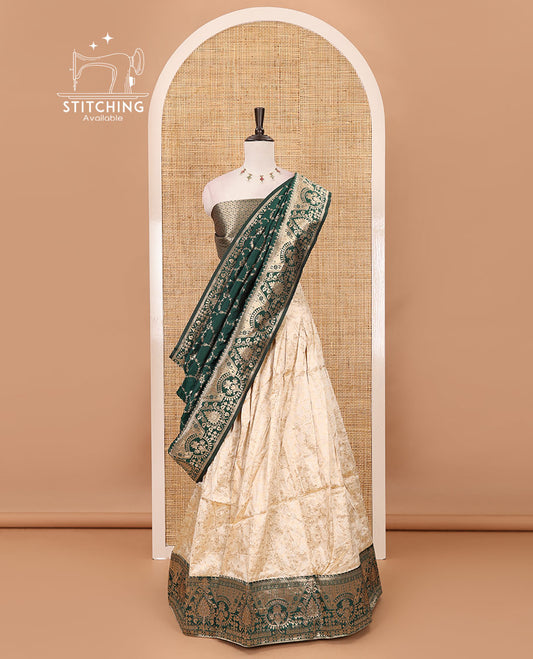 Cream-bottle green semi-banaras half-saree, floral jaal jacquard & contrast traditional zari border skirt, floral jacquard blouse & contrast zari design blouse