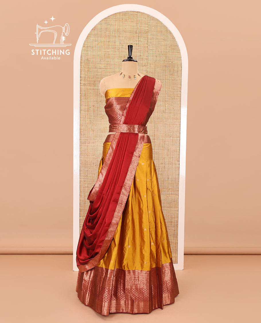 Mustard-maroon taffeta half-saree, zari buttas with contrast traditional zari bordered skirt, a matching blouse, and contrast zari border dhavani with belt