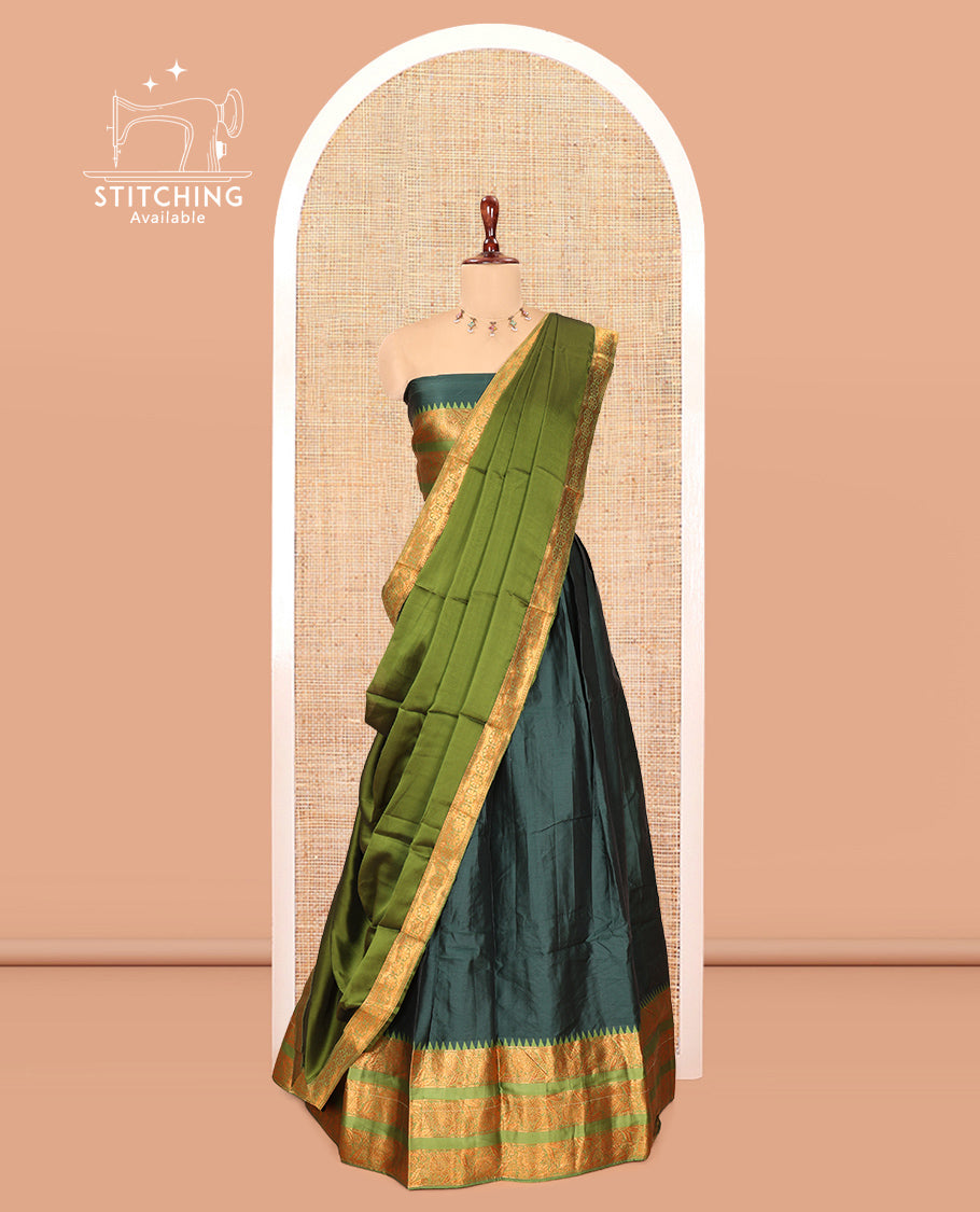 Bottle Green Semi-Banarasi Half-Saree Features Plain Skirt, Contrast Floral Creeper Zari Border, Matching Blouse, Contrast Dhavani