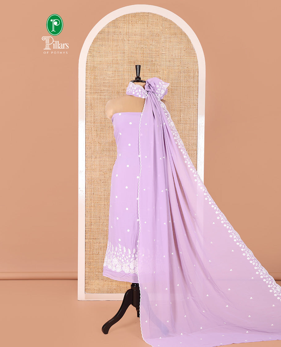 Lavender Fox Georgette Material Chudidar Set, Meticulously Crafted with Floral Embroidery on Its Top, a Plain Santoon Bottom, and Paired with a Floral Embroidered Scallop Dupatta