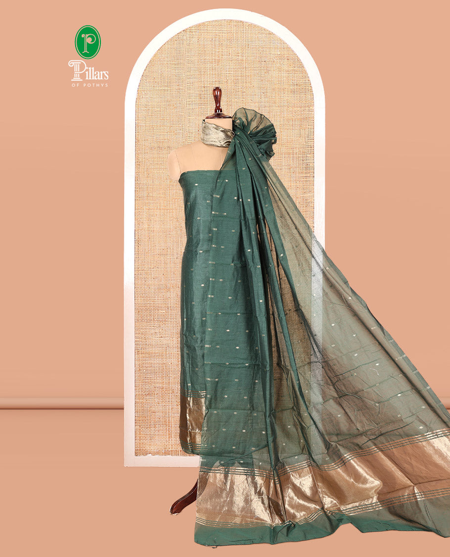 Green Banarasi Chanderi Material Churidar Features Zari Buttas Top, a Plain Bottom, and a Matching Dupatta