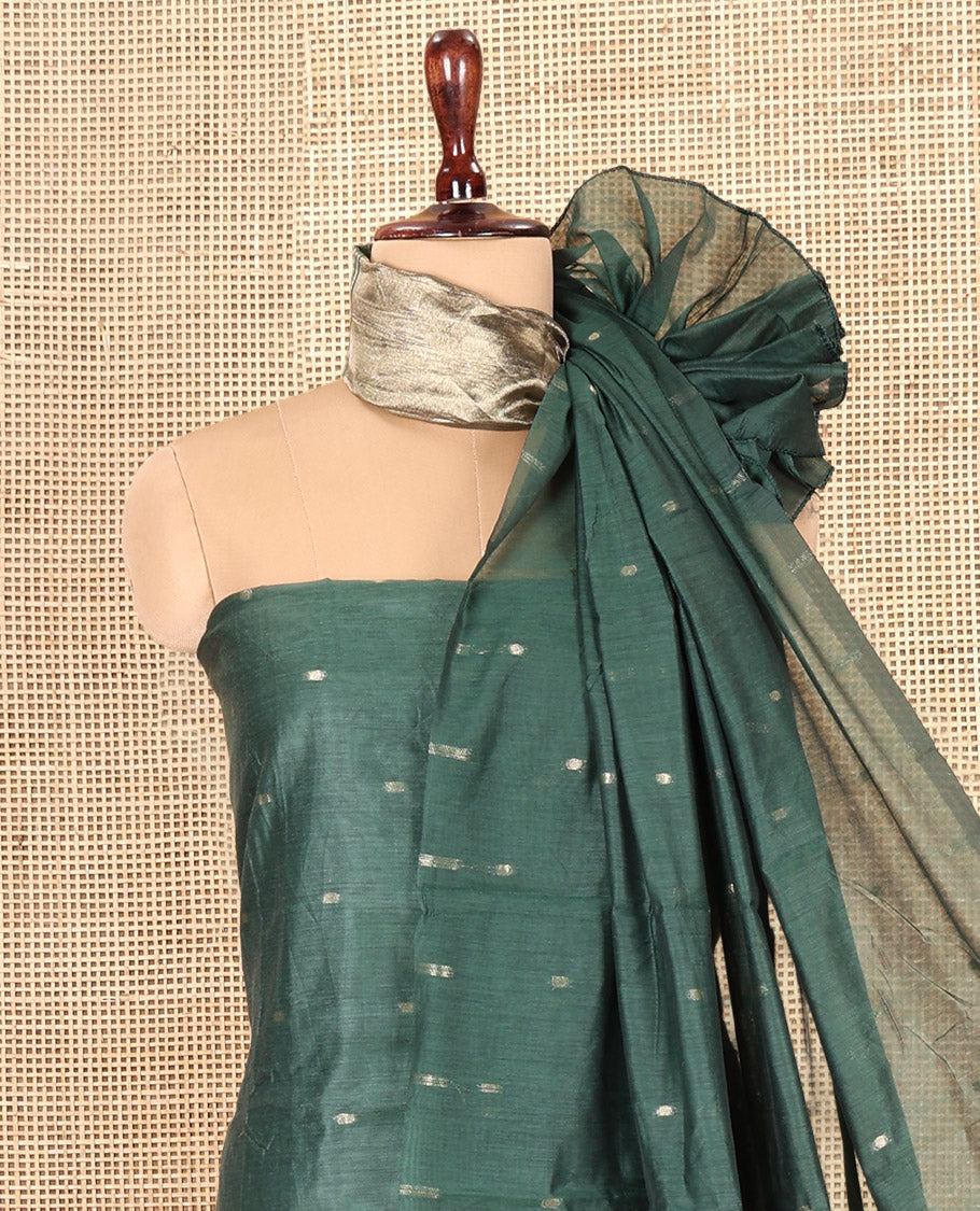 Green Banarasi Chanderi Material Churidar Features Zari Buttas Top, a Plain Bottom, and a Matching Dupatta