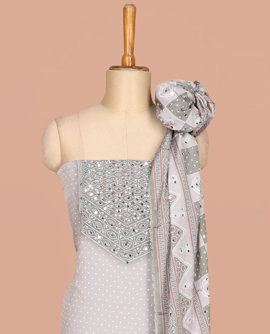 Grey bhandani print, stone,mirror work crepe chudidhar material top with american crepe pant & chinnon material bhandani print, mirror work dupatta