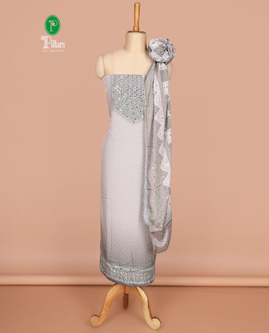 Grey bhandani print, stone,mirror work crepe chudidhar material top with american crepe pant & chinnon material bhandani print, mirror work dupatta