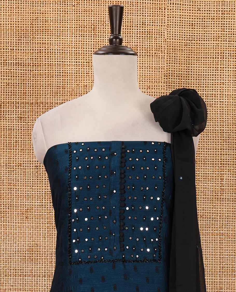 Blue material chudidar set, black beads & mirror neck embroidered with buttas woven vichitra silk top, santoon bottom & contrast mirror work chiffon dupatta