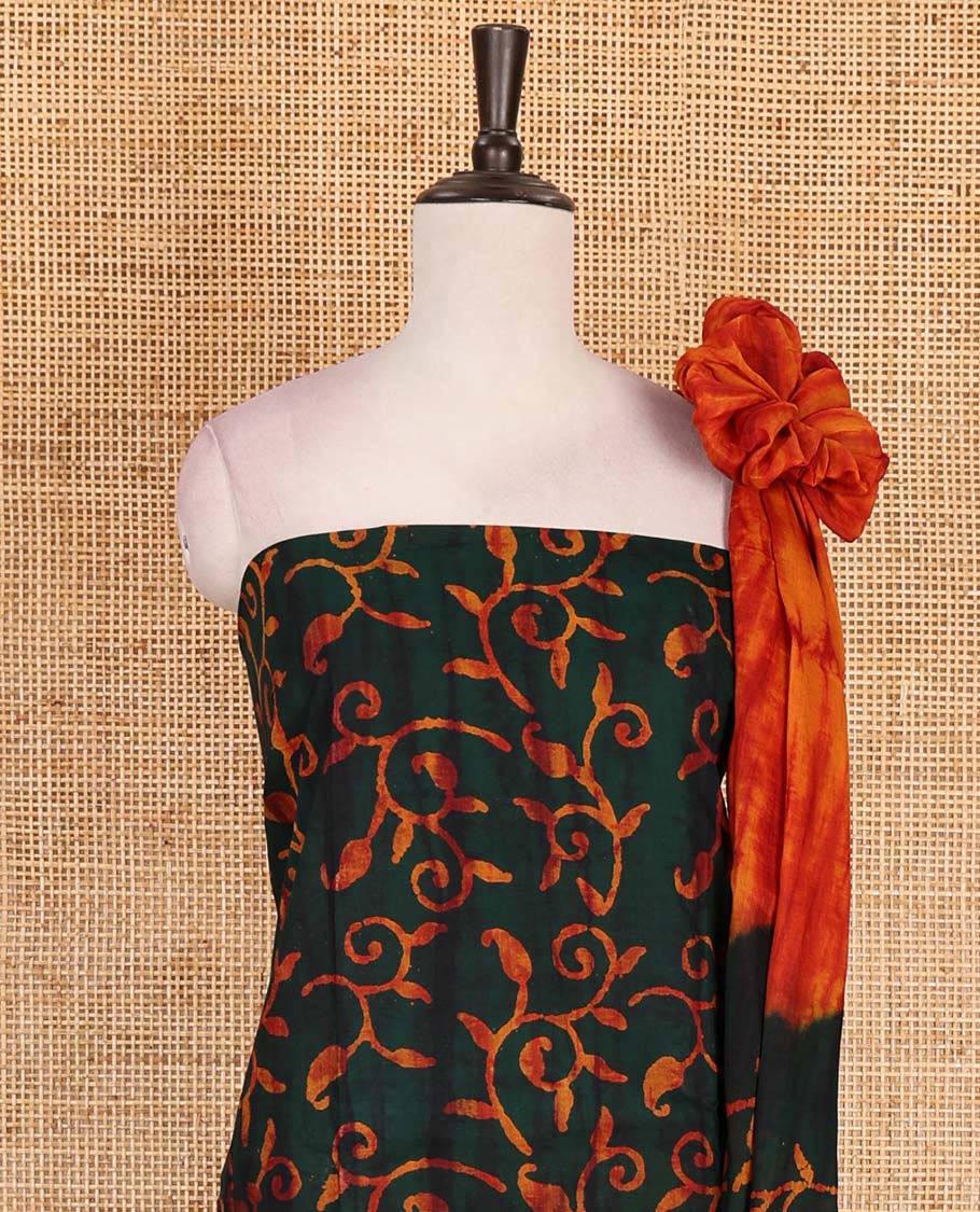 Dark green cotton material chudidar set, paisley vine batik printed top, contrast plain bottom, and dupatta of shibori and batik print