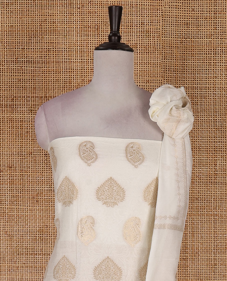 Kerala cream material chudidar set, embossed with gold zari woven mul chanderi top, santoon bottom, and zari woven mul chanderi dupatta