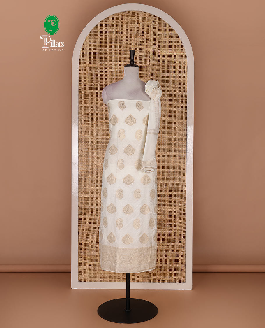 Kerala cream material chudidar set, embossed with gold zari woven mul chanderi top, santoon bottom, and zari woven mul chanderi dupatta