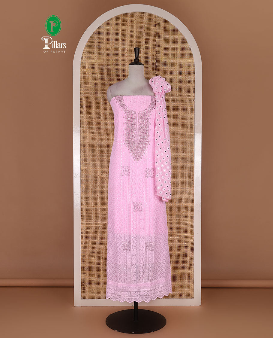Light Pink material churidar set, stone work with Schiffli style embroidered georgette top, American Crape bottom, and polka dotted printed mirror work dupatta