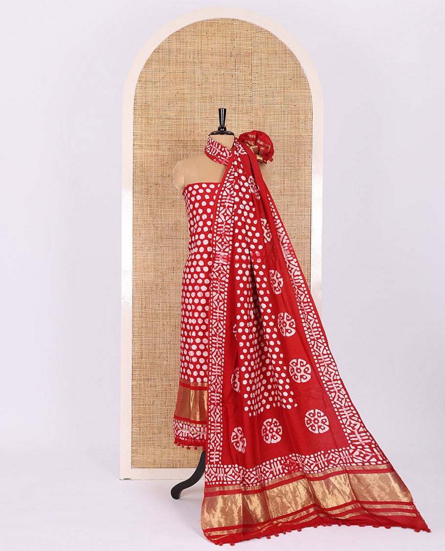 Red maroon material chudidar set, polka dots batik printed modal chanderi top, batik motifs printed bottom, and a batik motifs printed modal chanderi dupatta