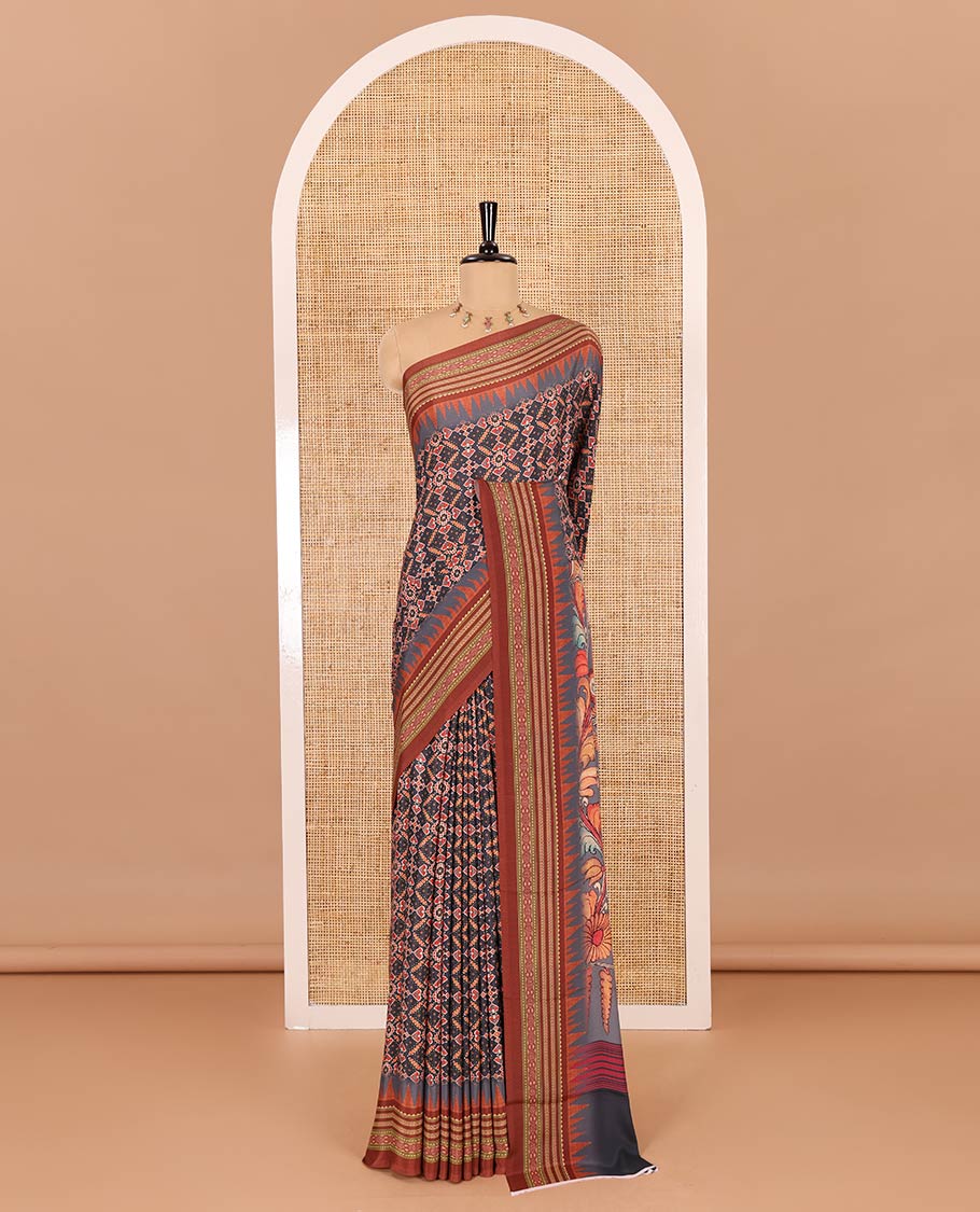 Grey patola style geometric printed Italian Crepe saree, contrast temple ikkat printed border, Kalamkari printed pallu, and a printed bordered blouse
