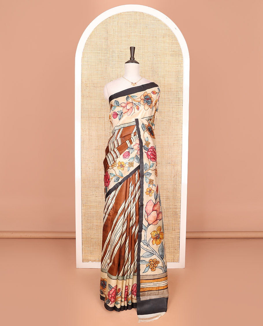 Brown diagonal stripes printed saree, contrast floral creeper printed border, and floral printed pallu