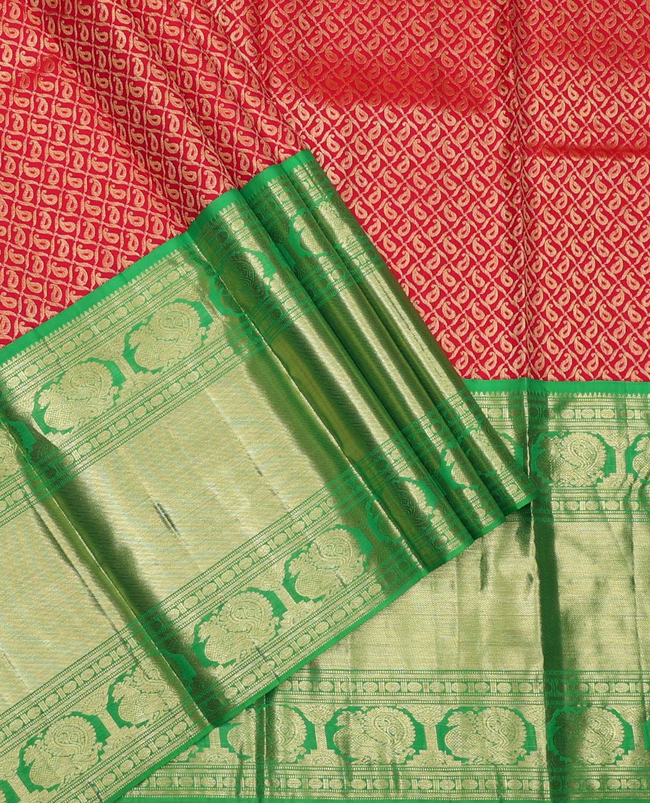 Red Pure Silk Half-Saree, Boldly Accentuated with Jacquard Design on Its Skirt, Complemented by a Contrast Border of Rekku, Banaras, Muthu, Rudaksham, and Mayil Designs, Comes with a Contrast Blouse and a Dhavani of Jaal Designs