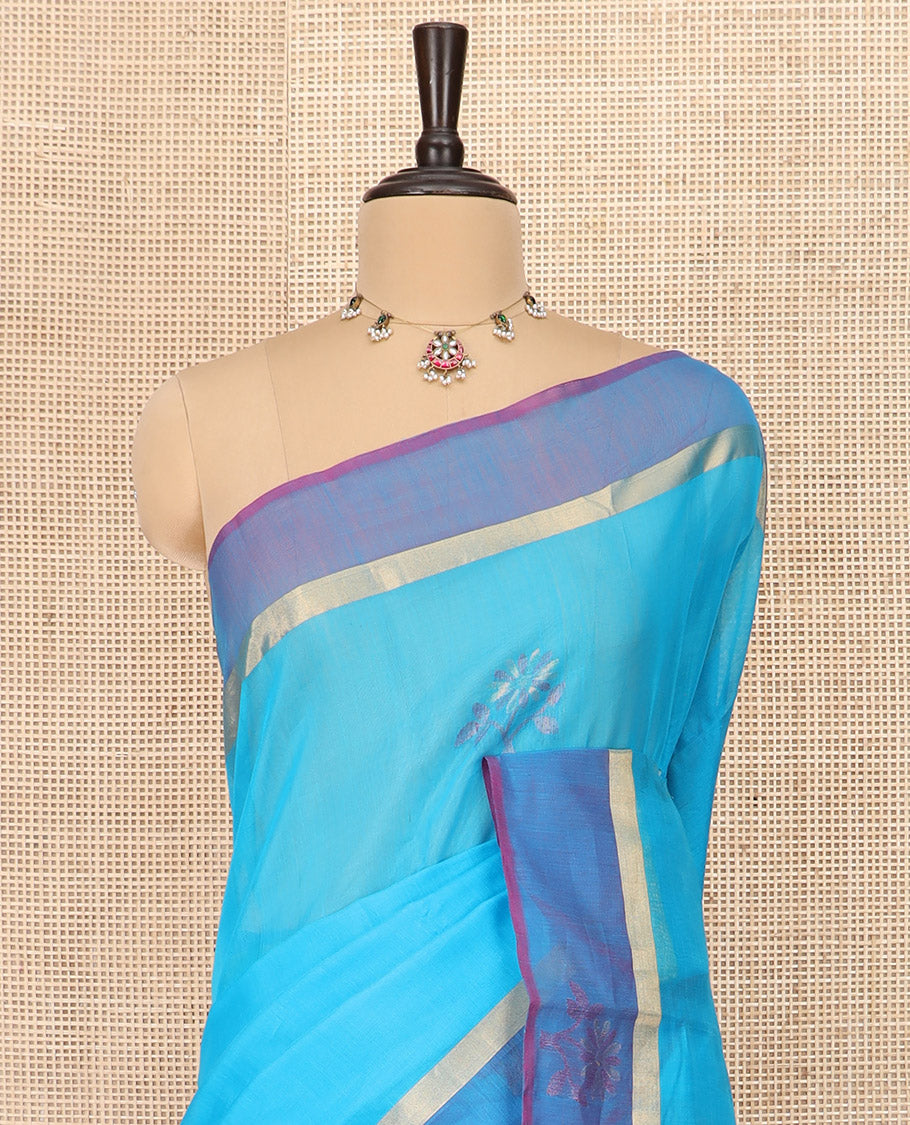 Blue Silk Cotton Saree Ornamented with Buttas All Over the Body, Complemented by a Contrast Floral Zari Motifs Border, Featuring a Contrast Pallu of Floral Zari Designs, and Paired with a Contrast Blouse