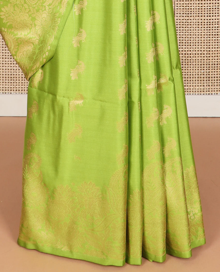 Green buttas soft silk saree with self floral design border & intricate zari design pallu