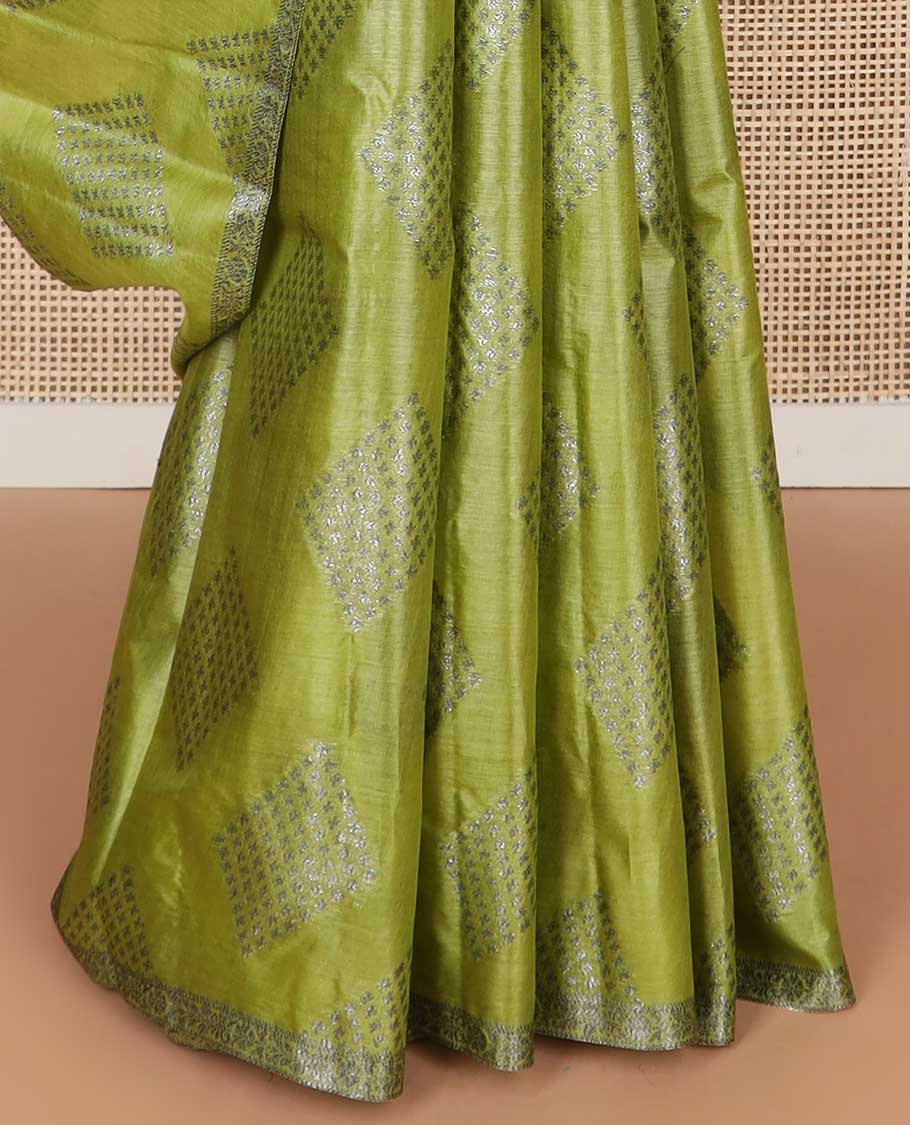 Green geometric motifs tussar silk saree with self zari design border & floral design pallu