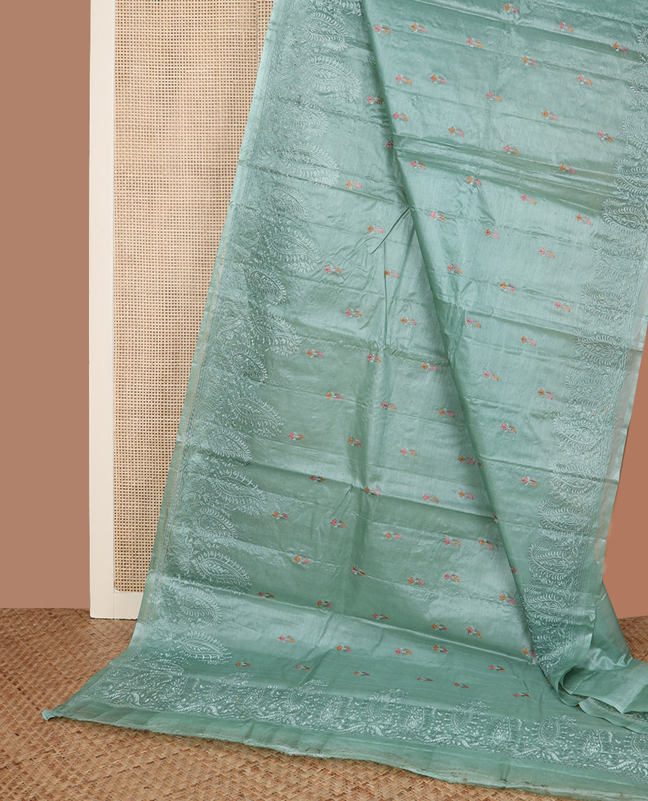 Green paisley motifs, multi-color thread embroidered tussar saree, paisley thread embroidered border, and pallu