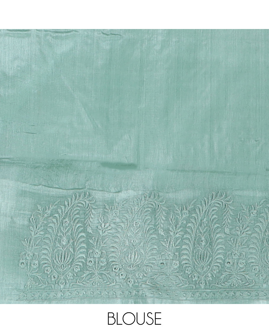 Green paisley motifs, multi-color thread embroidered tussar saree, paisley thread embroidered border, and pallu