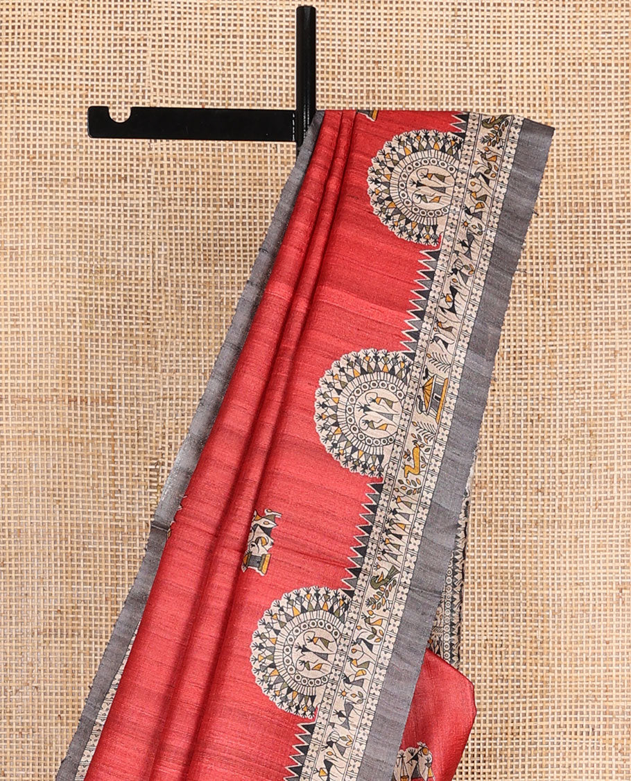 Red madhubani-style human motifs printed tussar saree, contrast border & pallu elevated with madhubani-themed motifs