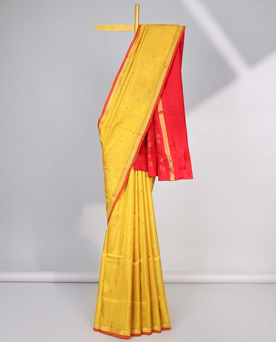 Yellow motifs uppada silk saree with contrast zari border & floral vine design pallu