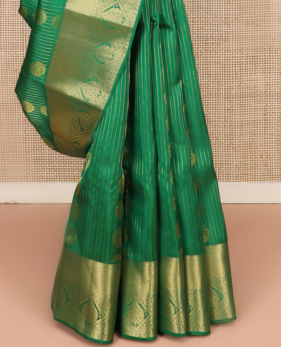 Green Vasundhara Lite Silk Mix Saree, Subtly Sparkled with Zari Buttas All Over Its Body, Complemented by Zari Border, Grand Pallu Steeped with Traditional Designs, and Paired with a Matching Blouse