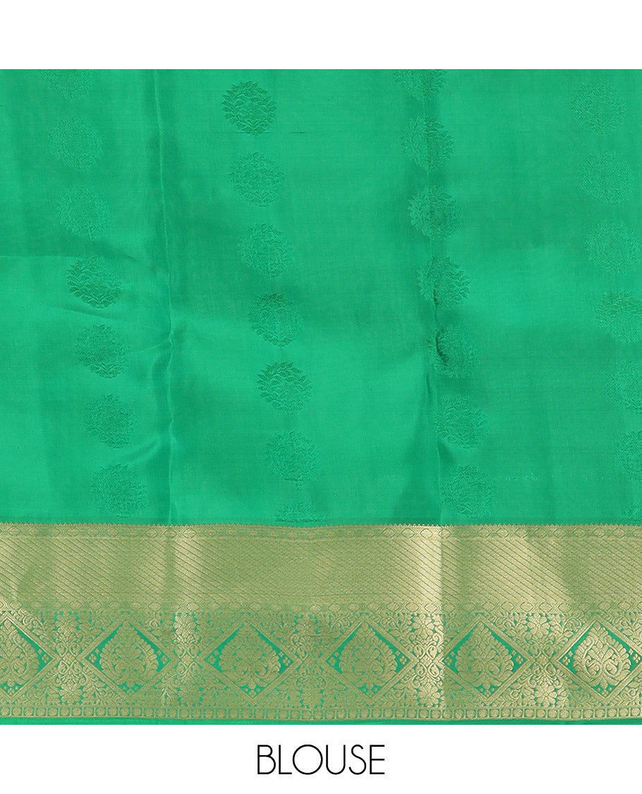 Green Vasundhara Lite Silk Mix Saree, Subtly Sparkled with Zari Buttas All Over Its Body, Complemented by Zari Border, Grand Pallu Steeped with Traditional Designs, and Paired with a Matching Blouse
