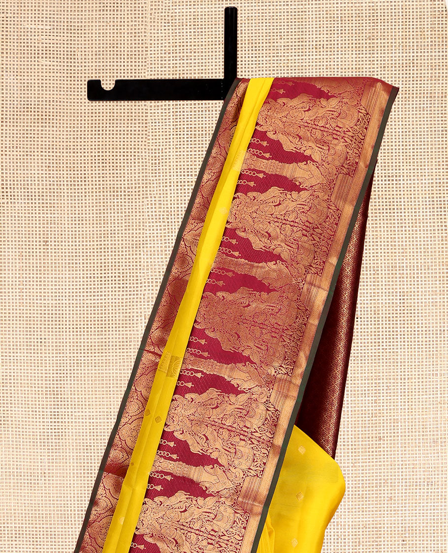 Yellow Vasundhara Lite Silk Mix Saree, Sparsely Woven with Zari Buttas, Contrast Border of Divine and Mythological Animal Characters, Grand Pallu, and a Contrast Blouse