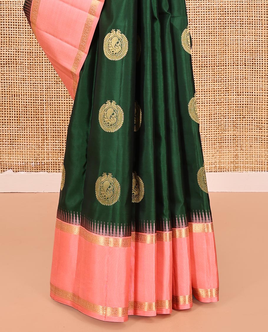 Green Vasundhara Silk Saree, Finely Crafted with Round Mayil Buttas All Over Its Body, Complemented by a Contrast Rettai Pettu Temple Border of Zari Designs, Grand Jaal Pallu, and Paired with a Contrast Blouse
