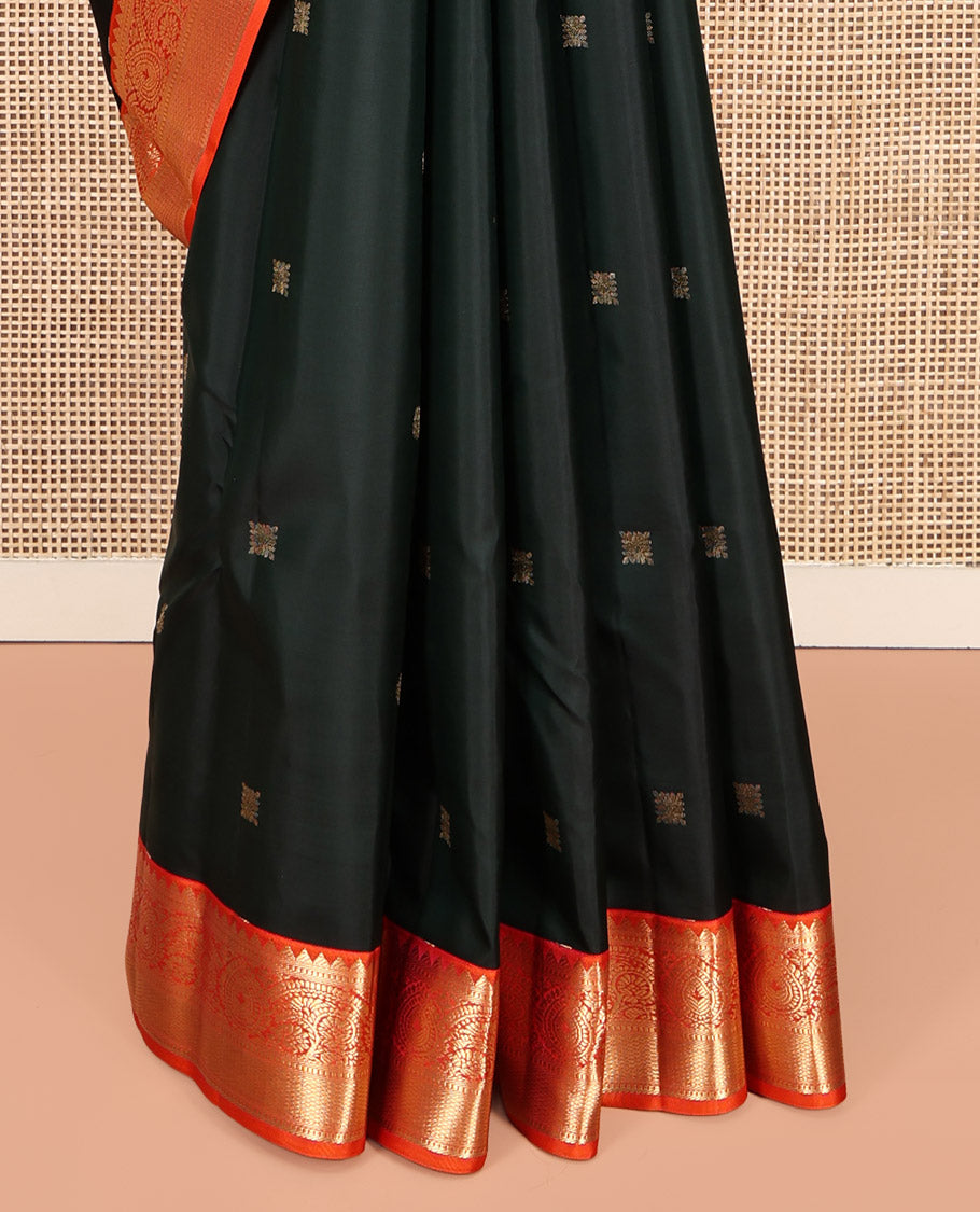 Green Vasundhara Silk Saree, Accentuated with Zari Buttas, Contrast Traditional Zari Border, Grand Pallu, and a Contrast Blouse