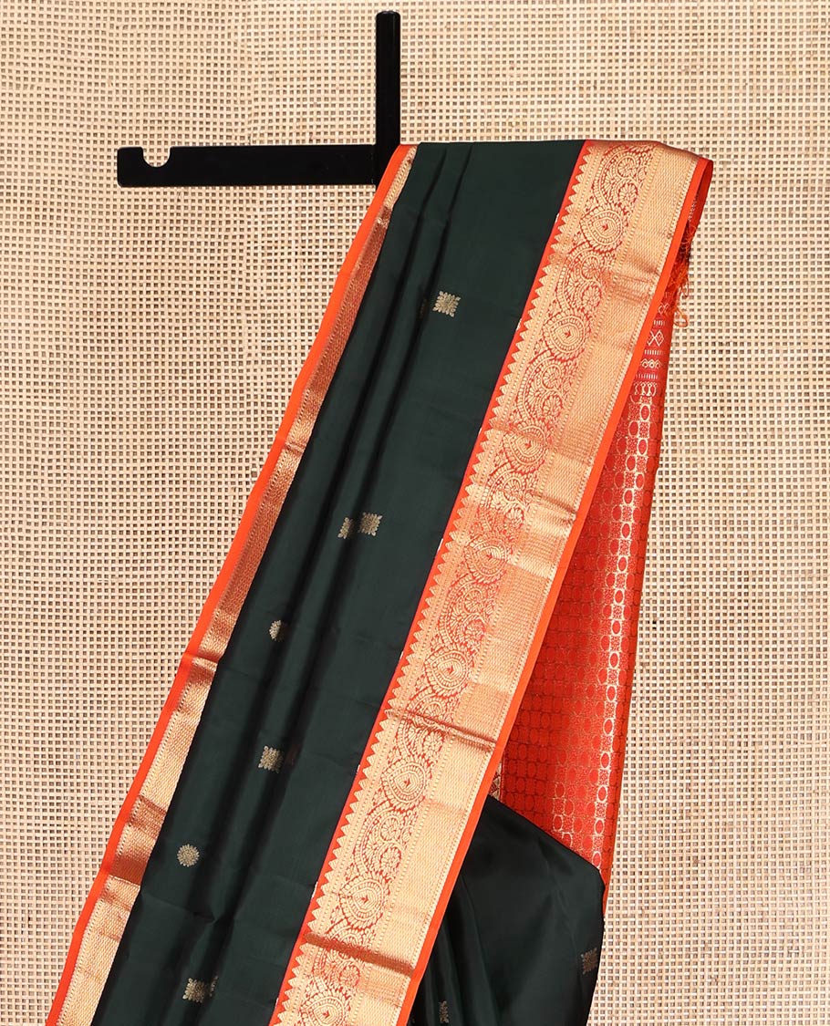 Green Vasundhara Silk Saree, Accentuated with Zari Buttas, Contrast Traditional Zari Border, Grand Pallu, and a Contrast Blouse