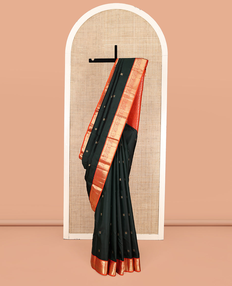 Green Vasundhara Silk Saree, Accentuated with Zari Buttas, Contrast Traditional Zari Border, Grand Pallu, and a Contrast Blouse