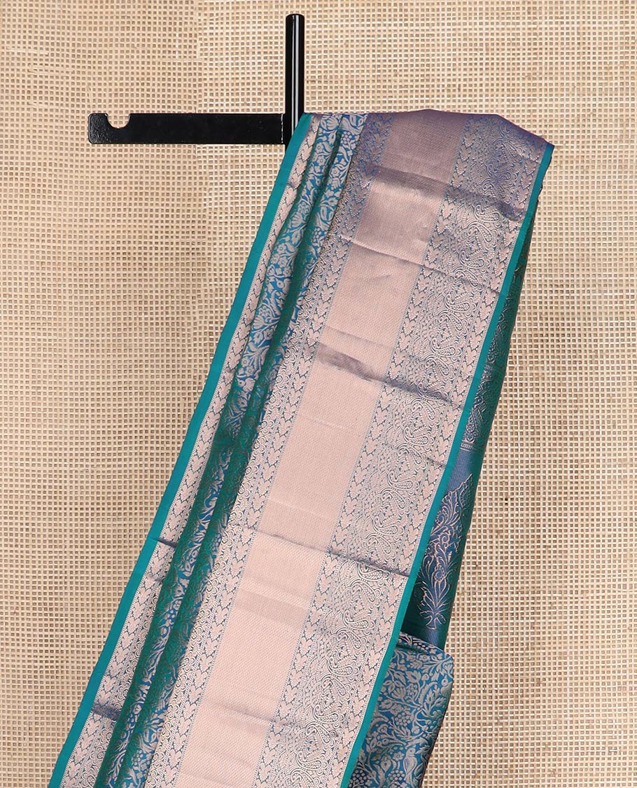 Blue jacquard Kanchipuram wedding silk saree, zari border of rekku, muthu, manga, and mayil kan designs, and intricate zari pallu